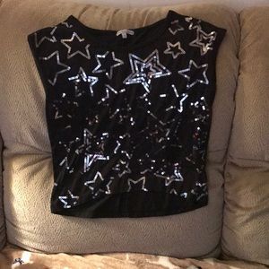 A black shirt with silver stars